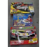 Scalextric Auto-City, Ultimate Velocity and Bash 'N Crash 1, all boxed