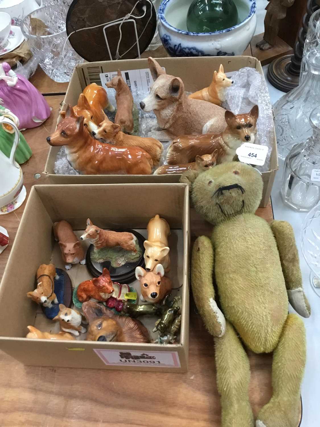 Old teddy bear ( approximately 90 years old) and a collection of Corgi ornaments