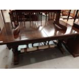 Large carved oak refectory table and set of ensuite chairs