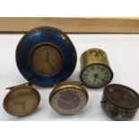 Five vintage desk and car clocks including two enamelled