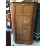 1950s oak corner hall wardrobe with panelled door on bracket feet 105 cm wide, 183 cm high