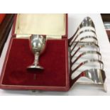 Silver egg cup in fitted case and contemporary silver plated toast rack