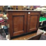 Victorian mahogany nest of pigeon holes enclosed by two panelled doors 71cm wide, 54cm high, 28cm de