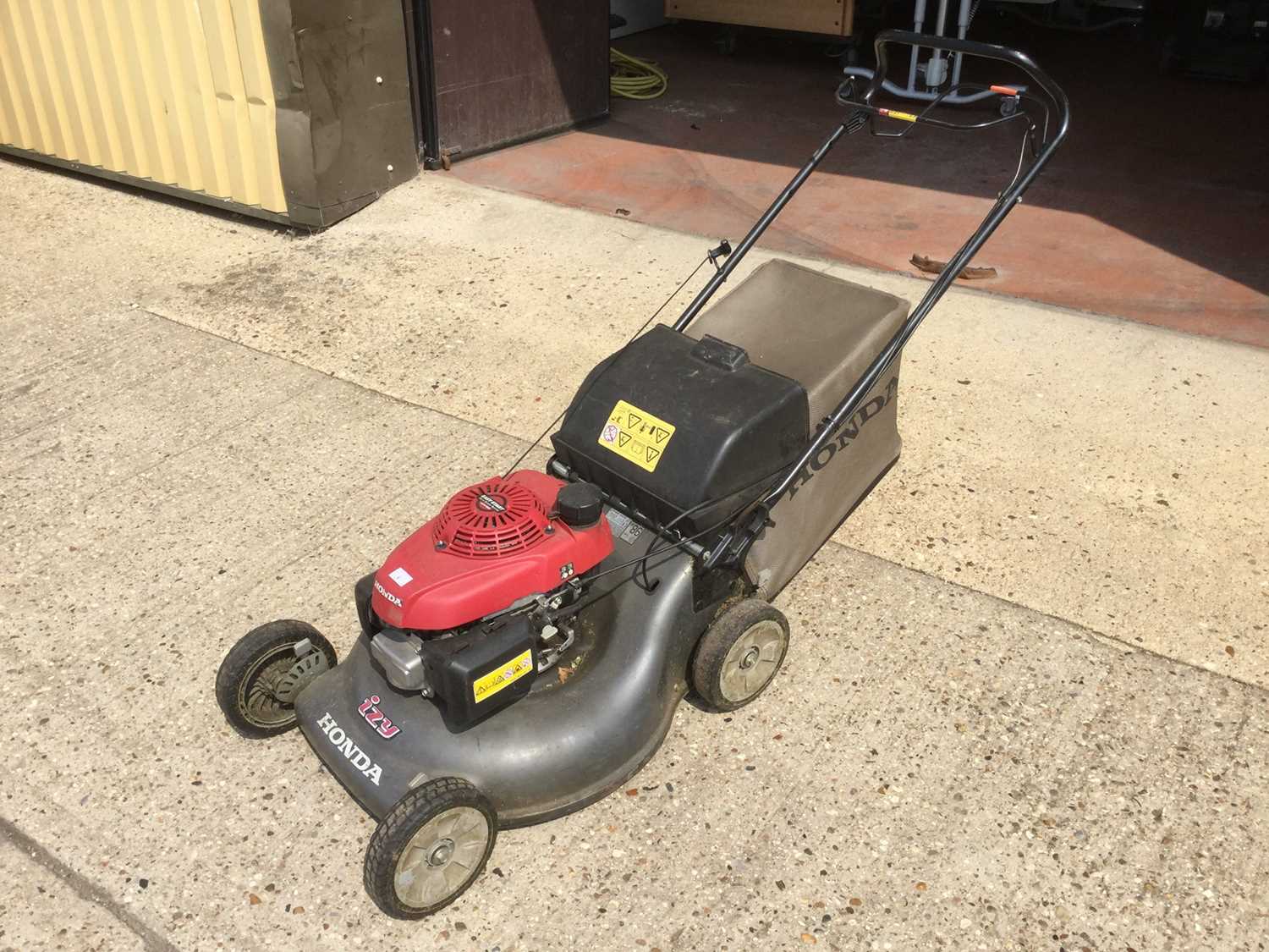 Honda Izy self propelled petrol lawnmower with grass box