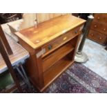 Yew wood open bookcase with single drawer
