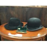 Vintage bowler hat and spectacles in leather covered case