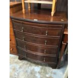 Small chest of drawers with drop handles and pull-out slide