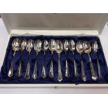 Set of 12 Continental silver (830 standard) teaspoons in fitted case