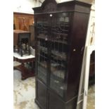 Edwardian carved oak bookcase with two leaded glazed doors and two panelled doors below 198cm high,