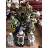 Pair Brownfield majolica figures carrying baskets and other Continental figures