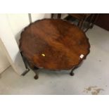 Walnut coffee table with pie crust top with cabriole legs