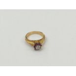 18ct gold ruby and diamond cluster ring