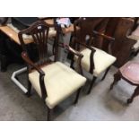 Pair of Georgian style mahogany elbow chairs