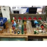 Large collection of Victorian and later coloured and clear glassware, paperweights, commemorative an