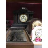 Victorian slate mantel clock with column decoration and three other clocks