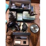 Wall barometer, wooden otter ornaments, old tins, leather map and sundries