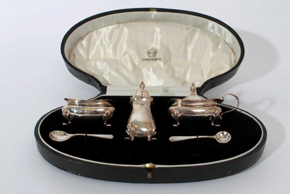 George V Silver three piece cruet set of cauldron form on hoof feet, the salt and mustard with remov