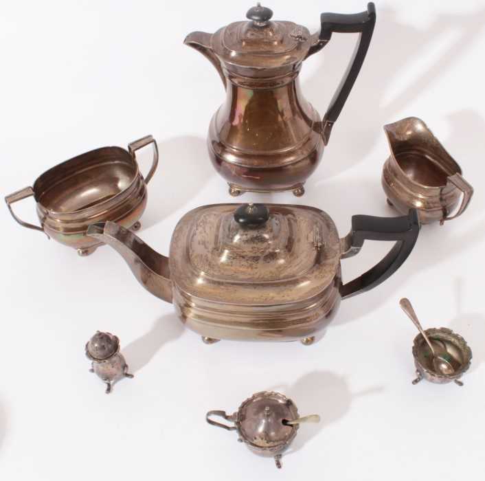 George VI silver four piece tea and coffee set- comprising teapot of compressed baluster form, hinge