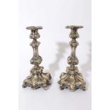 Pair of 19th century Continental silver plated candlesticks with eagles head design