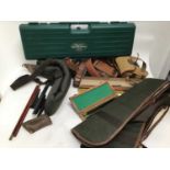 Mixed lot of sporting accessories to include gun slings, cleaning kits, four cartridge belts, plasti