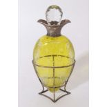 Victorian yellow overlaid cut glass decanter of amphora form with unusual decoration depicting the f