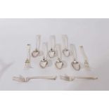 Six George III Old English pattern silver table spoons together with four Hanoverian pattern silver