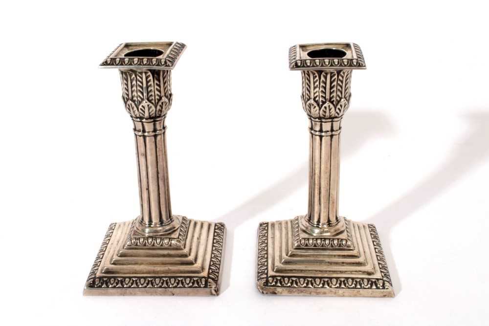 Pair Edwardian silver candlesticks with fluted columns, candle holders with acanthus leaf decoration