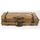 Three early 20th century leather and canvas gun cases, one named to lid J. F. Todhunter, Royal Artil