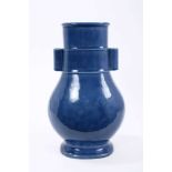 Large Chinese monochrome blue glazed vase, 19th/20th century, of archaic Hu form, 36cm height