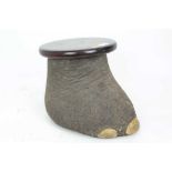 Early 20th century juvenile Elephants foot, hollow with wooden stool top