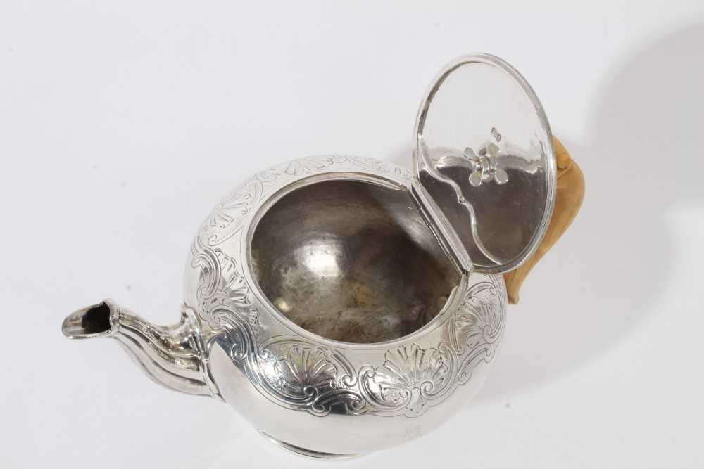 George IV silver teapot of bullet form with chased scroll and shell decoration, engraved Ducal crown - Image 5 of 7