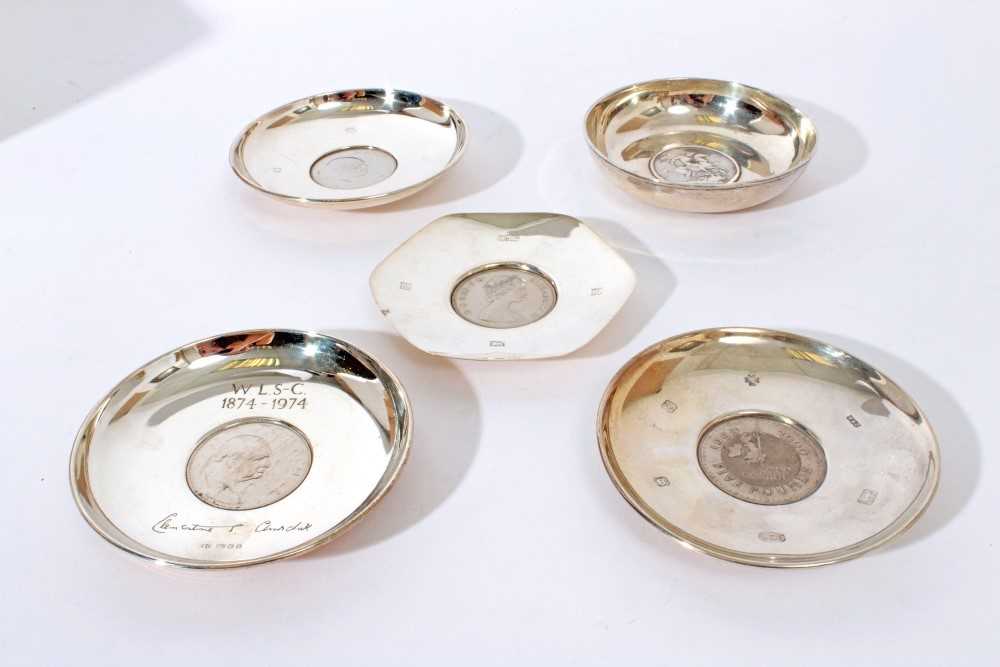 Contemporary silver dish of circular form set with an 1821 Crown (London 1964) together with four ot