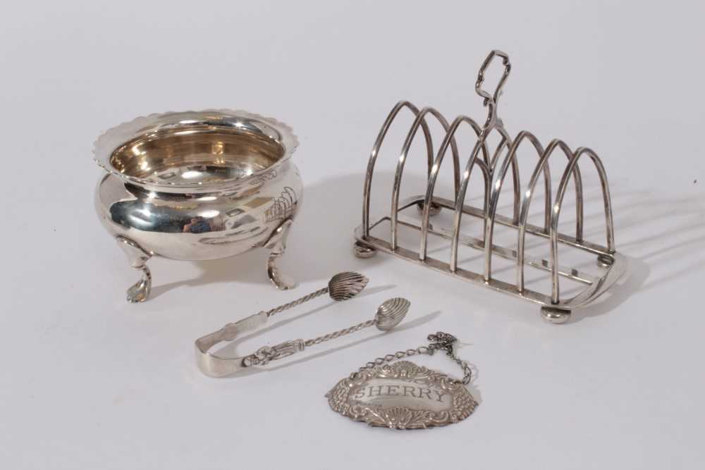 George V Silver six division toast rack (Birmingham 1919) together with a silver sugar bowl raised o