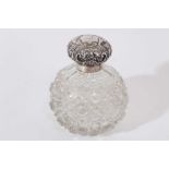 Edwardian cut glass scent bottle, of globular form with hobnail cut decoration and star cut base, si