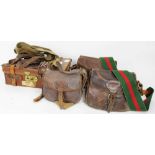 Three leather cartridge bags, leather and canvas covered cartridge magazine and four spare leather a