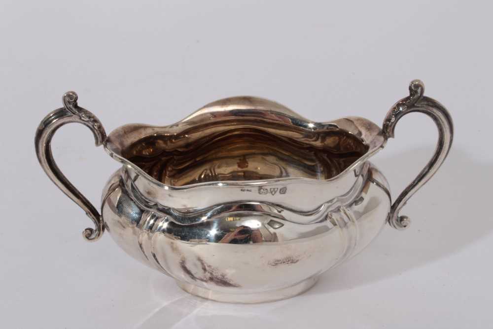 George VI silver sauce boat of helmet form, raised on three hoof feet (Birmingham 1948) - Image 8 of 9