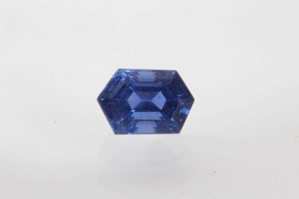 Unmounted blue sapphire, the hexagonal step cut stone measuring approximately 10.48mm x 7.03mm x 6.7