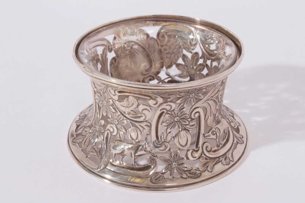 Edwardian silver dish of small proportions with pierced animal, scroll and foliate decoration, with