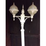 Set of four Parisienne style white painted metal floor standing lamp posts