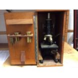 Vintage microscope in wooden case