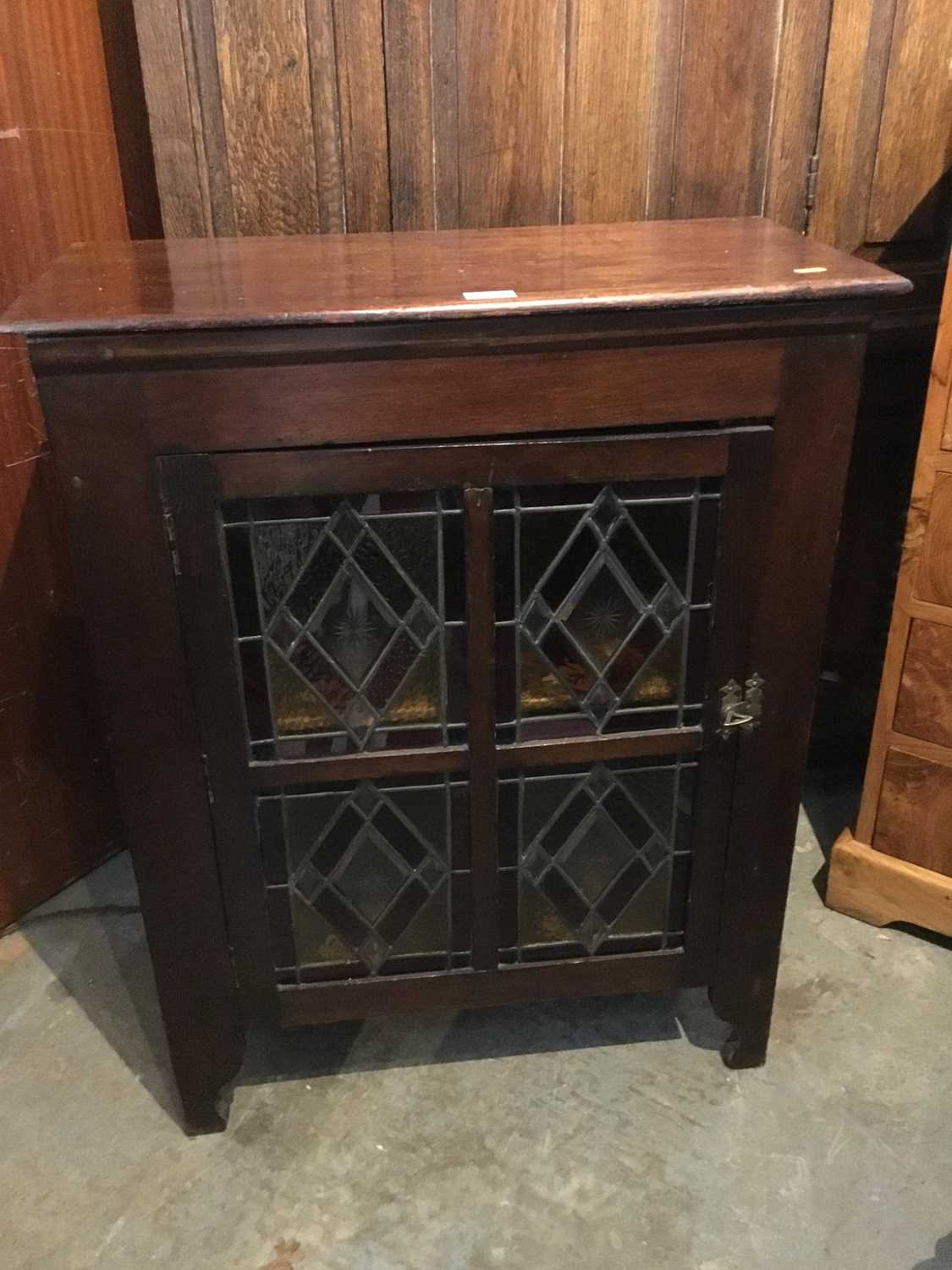 Victorian mahogany cupboard with stained glass panels on bracket feet. 68 cm wide, 86 cm high, 32 cm