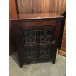 Victorian mahogany cupboard with stained glass panels on bracket feet. 68 cm wide, 86 cm high, 32 cm