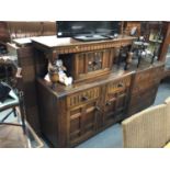 1950s carved oak court cupboard with baluster supports 122 cm wide