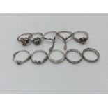 Group ten contemporary silver dress rings