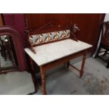 Edwardian washstand with marble top and tiled back