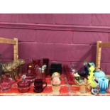 Cranberry wine glasses, sugar shakers and other ware plus vasoline and coloured glassware