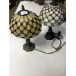 Two Tiffany style table lamps with leaded glass shades