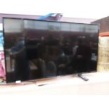 Panasonic flatscreen television model number TX-49ES503B with remote control
