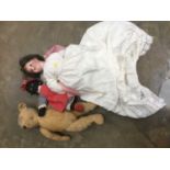 Antique teddy and two dolls