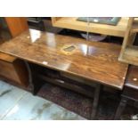 Small oak refectory table on end standards 121cm